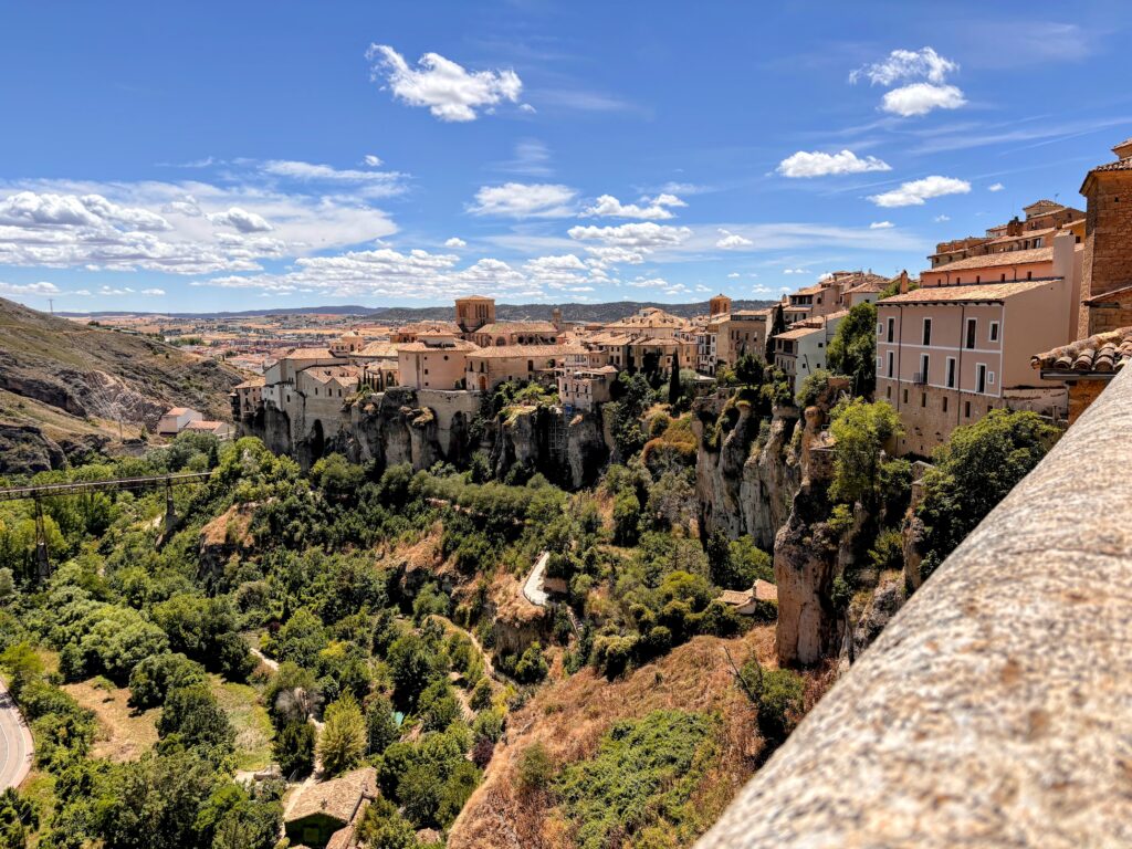 cuenca-lookout expansive view of the town o Cuenca, Spain with old building and verdent valley