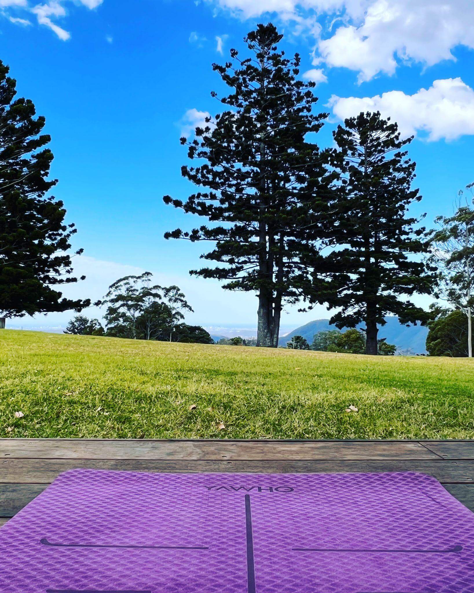 yoga on the deck at Three Pines House, Tamborine Mountain, Queensland, Australia with views to the gold coast