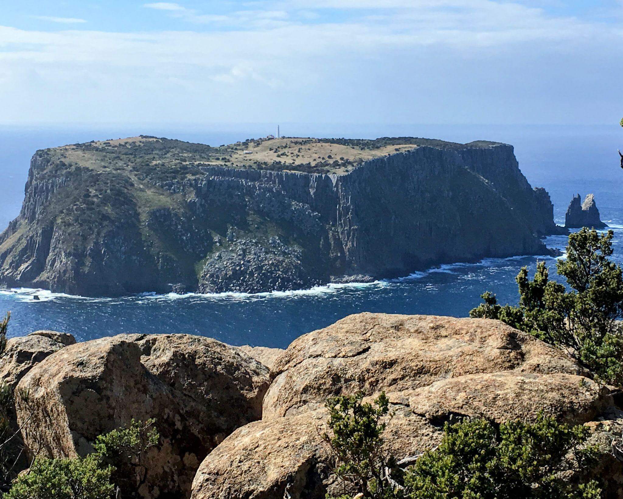 Spectacular clifftop traverse on day 3 of the Three Capes Track with views to Tasman Island