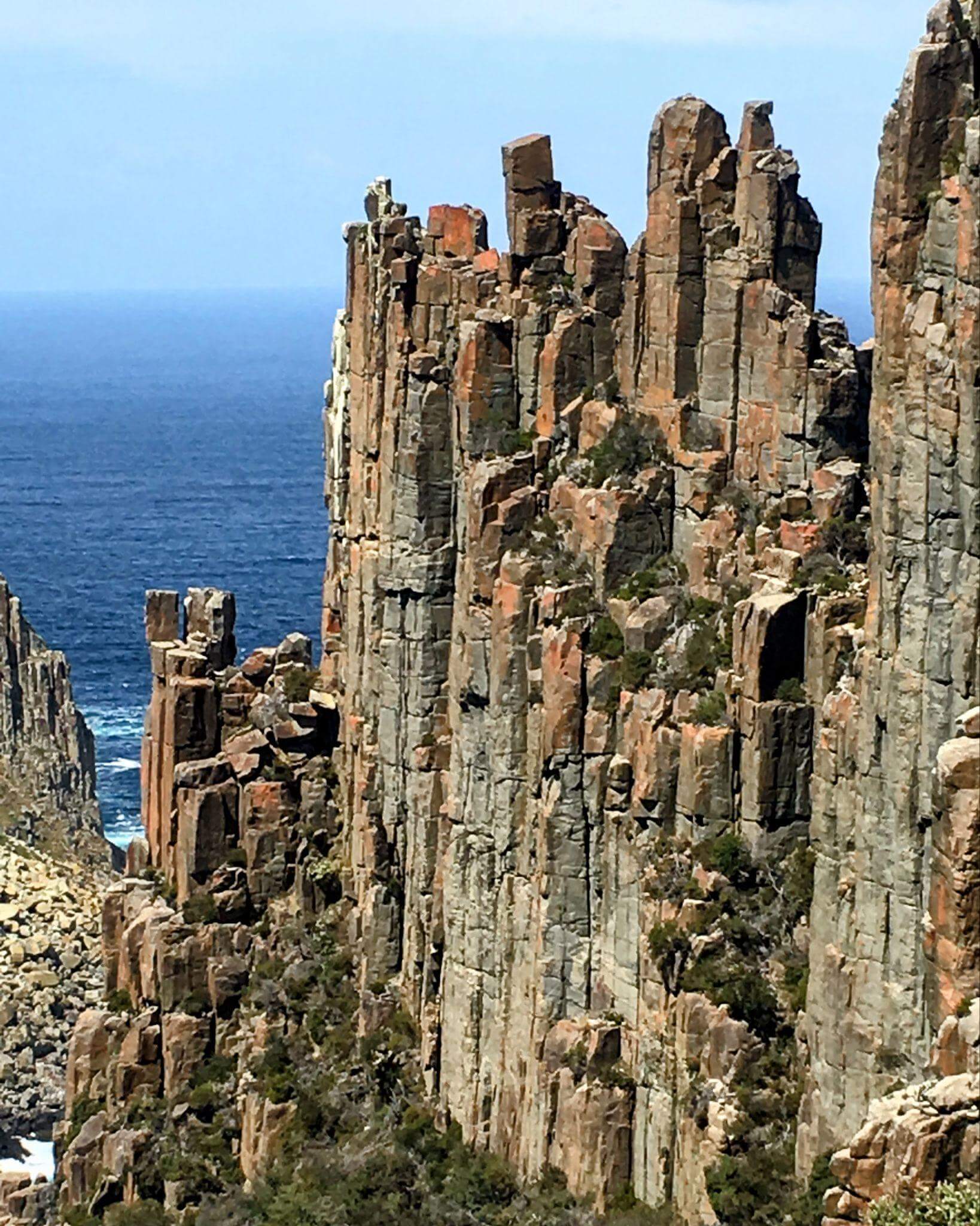 Spectacular dolerite cliff formations and geological features along Tasmania's Three Capes Track