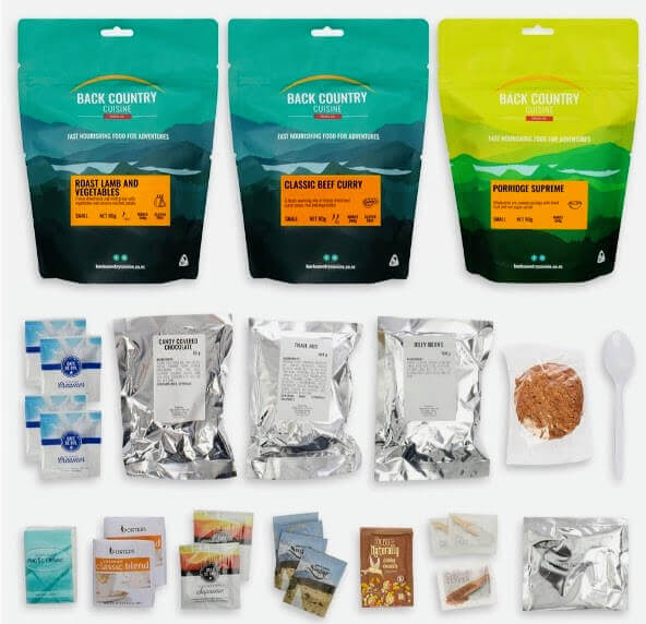 Back Country Cuisine dehydrated meals for multi-day hiking including roast lamb, beef curry, and porridge options alongside freeze-dried ingredients and camping meal sachets